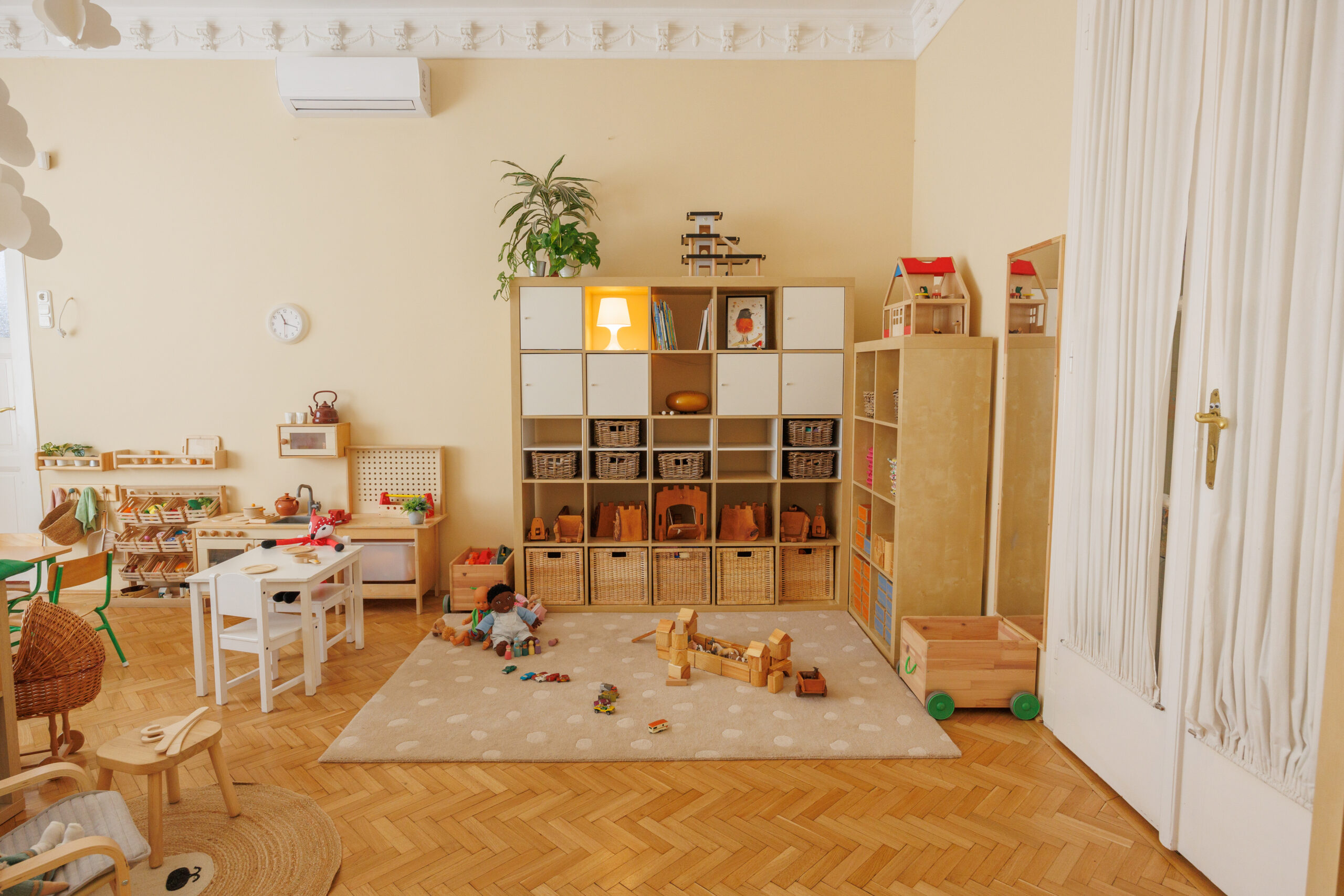 Kindergarten classroom showcasing multiple learning corners, including building & construction and role-play, after True Toys enhancement project